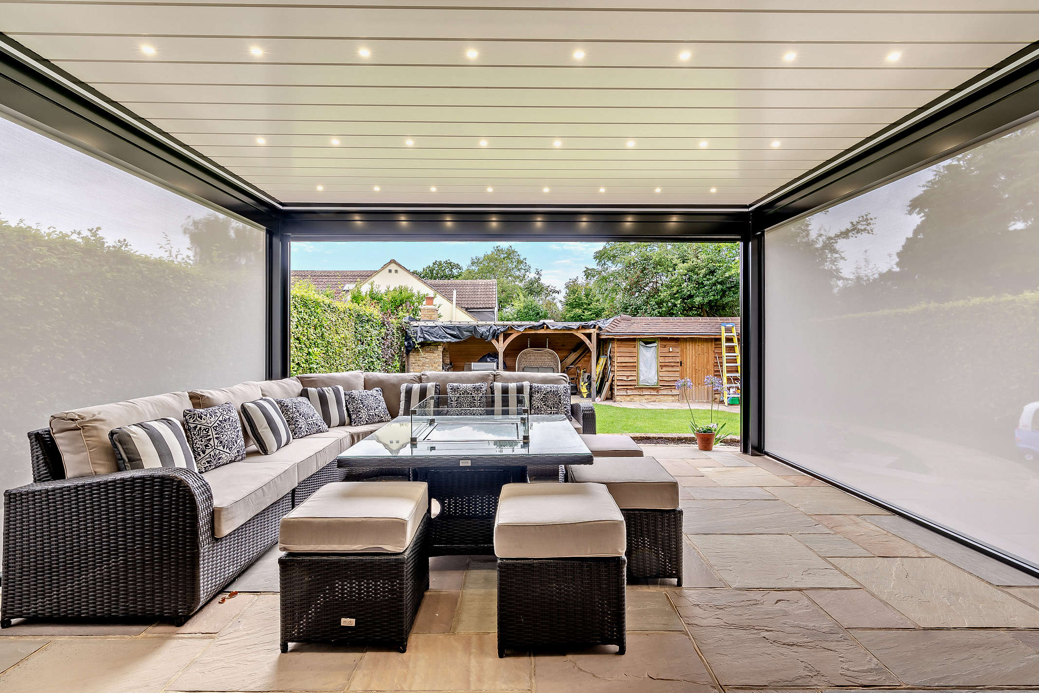 Lanai Iris louvred roof canopy in a UK garden