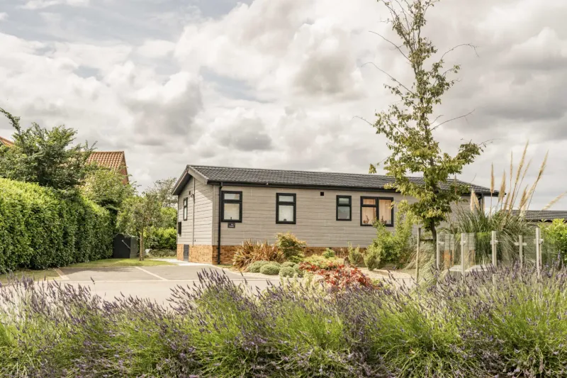 Luxury lodge exterior with surrounding nature