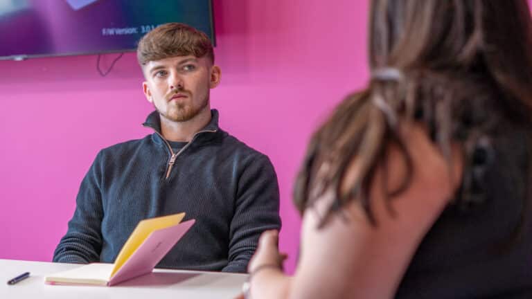 Fraud victim reviewing paperwork