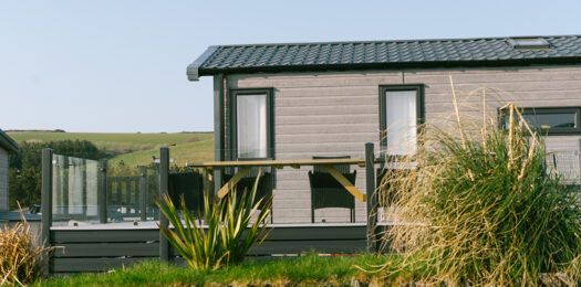 Lodge decking overlooking parkland at Sun Haven