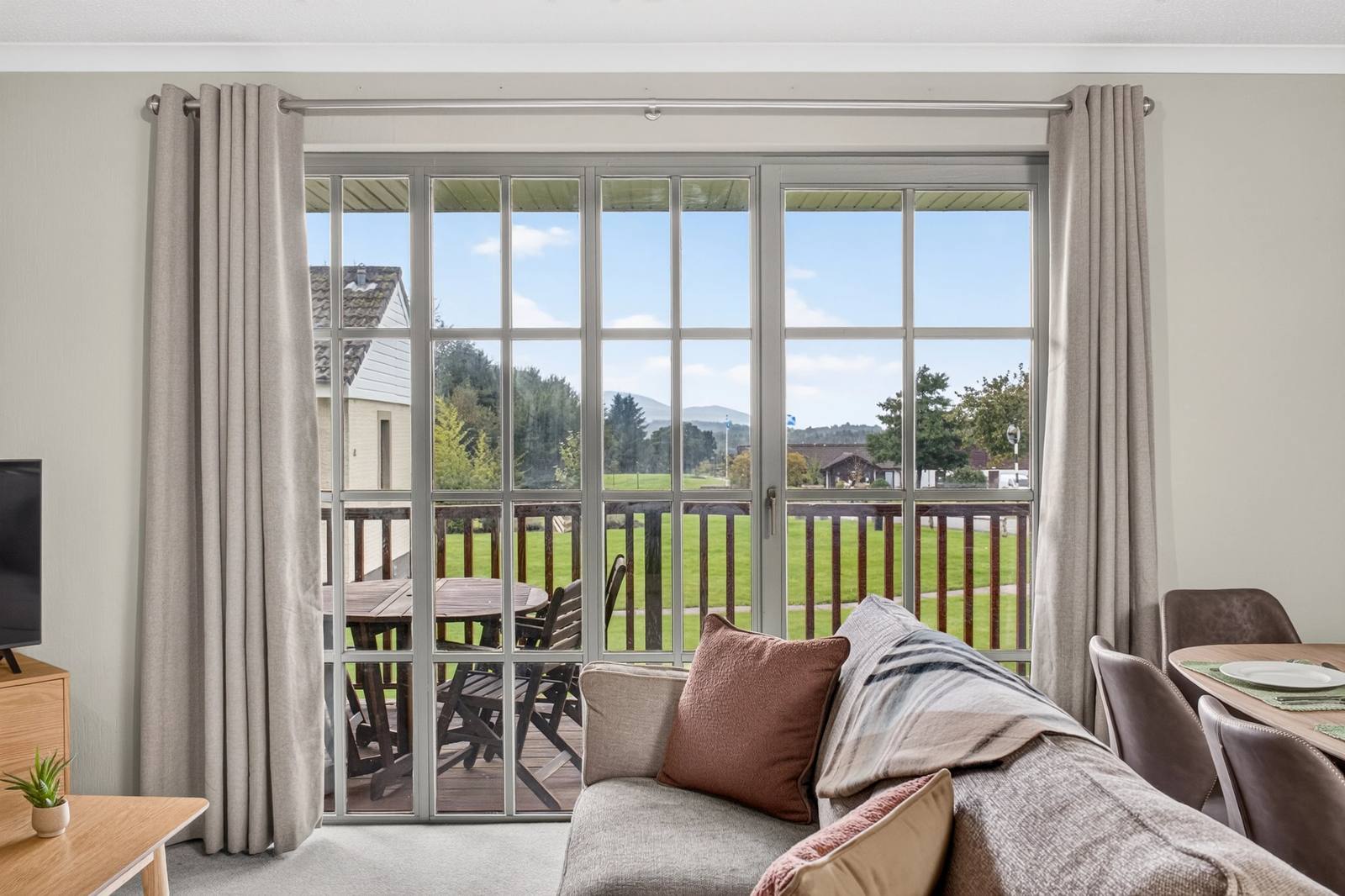 Open-plan living area opening onto a covered veranda