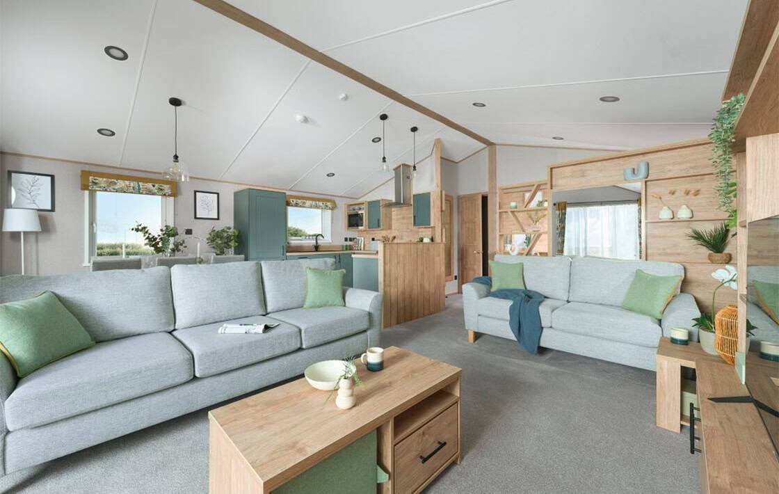 Lounge, kitchen and dining space inside a lodge