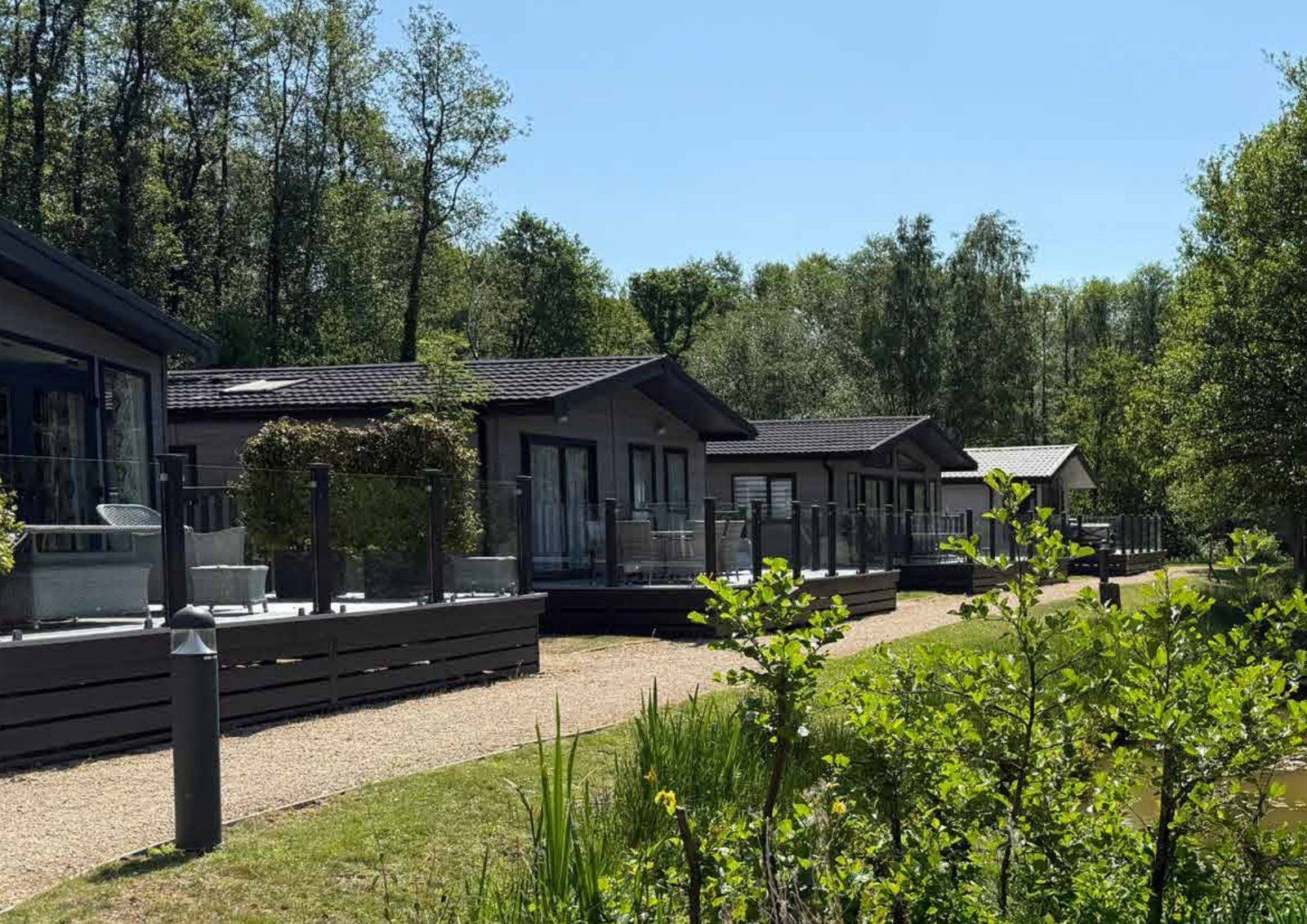 Lodges and holiday homes set in parkland at a Lovat Parks holiday park